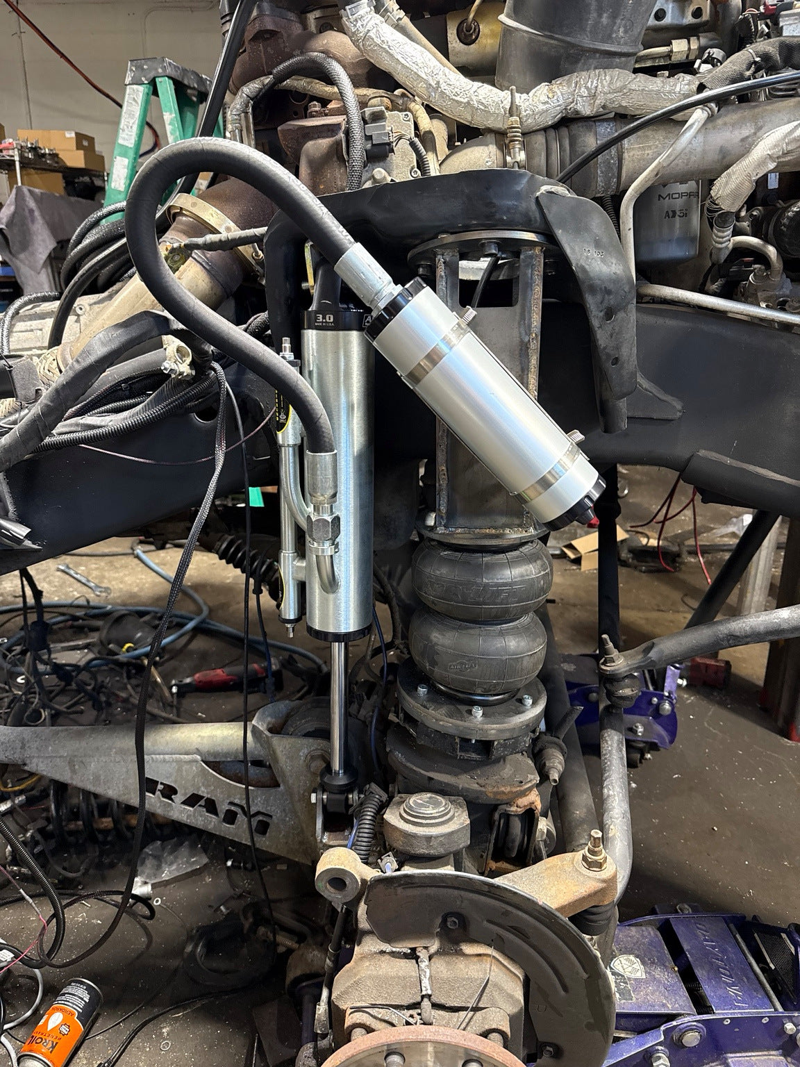 THE DUALLY front air spring, fabricated mount and ADS shock with remote reservoir.